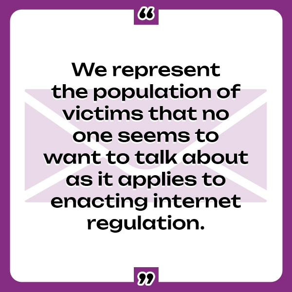 A cast figure of Lady Justice wearing a blindfold, holding up a pair of scales.